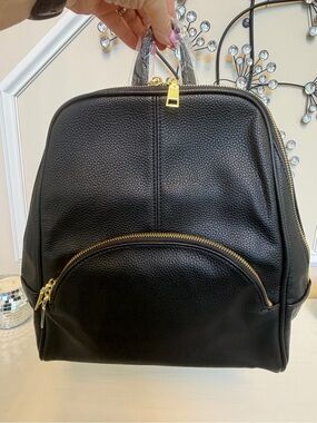 Structured Black Pebbled Backpack with Gold Zipper Accents